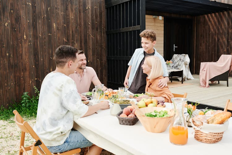 Family Sitting At The Table