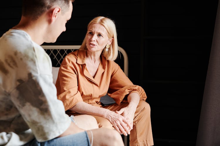 A Man And Woman Talking Together 