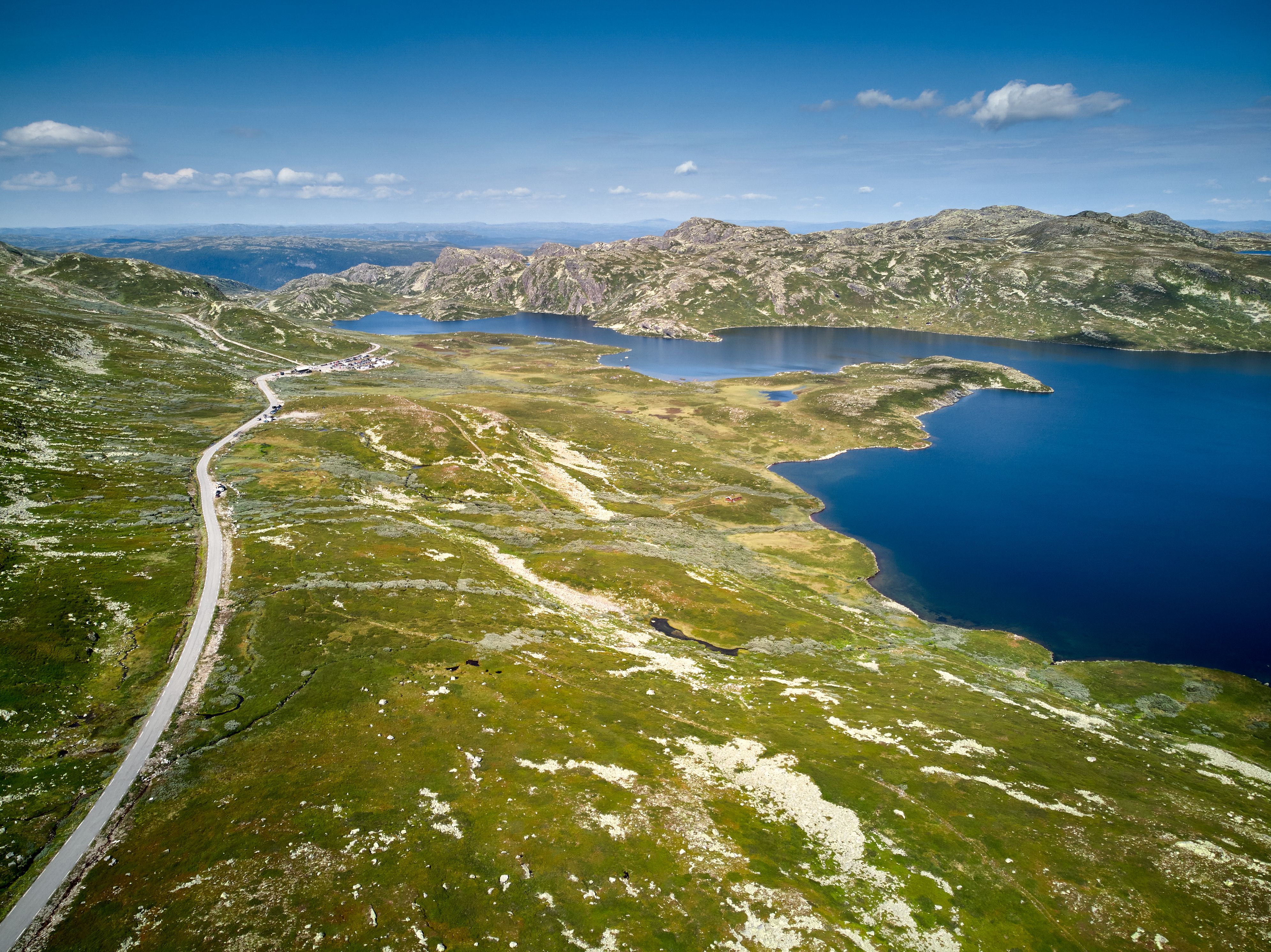 Stunning Tromsø: Fjord Adventure Tour with Wildlife and Lunch Review 2026 - Stunning aerial view of Hjartdal's lake and mountains under a clear sky in Vestfold og Telemark, Norway.