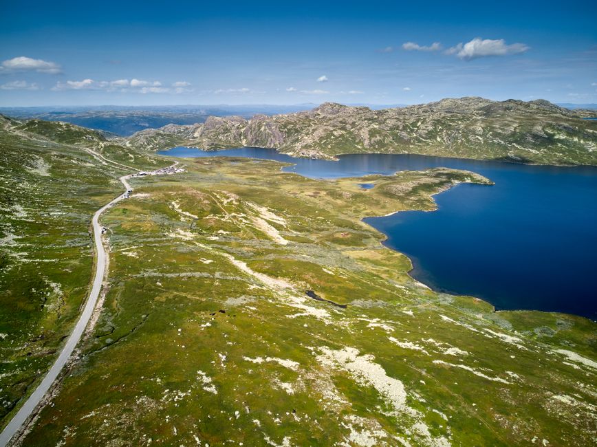 Stunning Tromsø: Fjord Adventure Tour with Wildlife and Lunch Review 2026 - Stunning aerial view of Hjartdal's lake and mountains under a clear sky in Vestfold og Telemark, Norway.