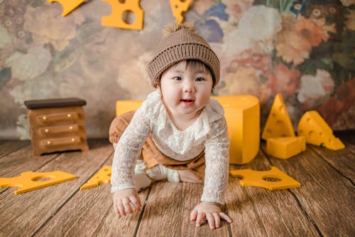Gratis stockfoto met baby, glimlach, hoed