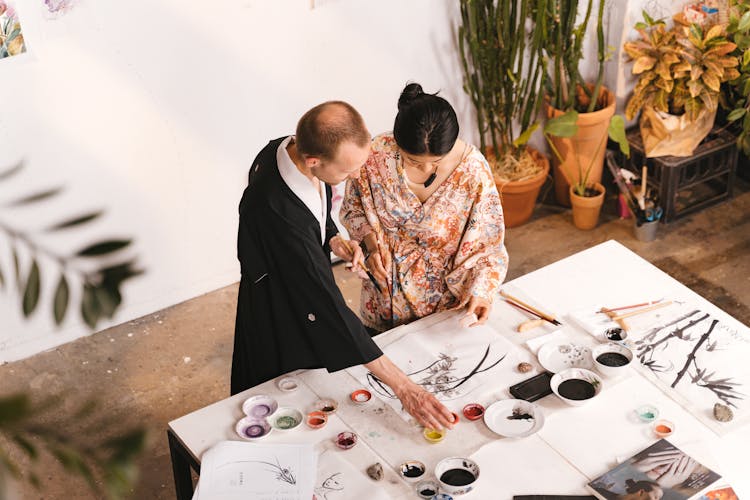 A Man And Woman Wearing Yukata Standing Together