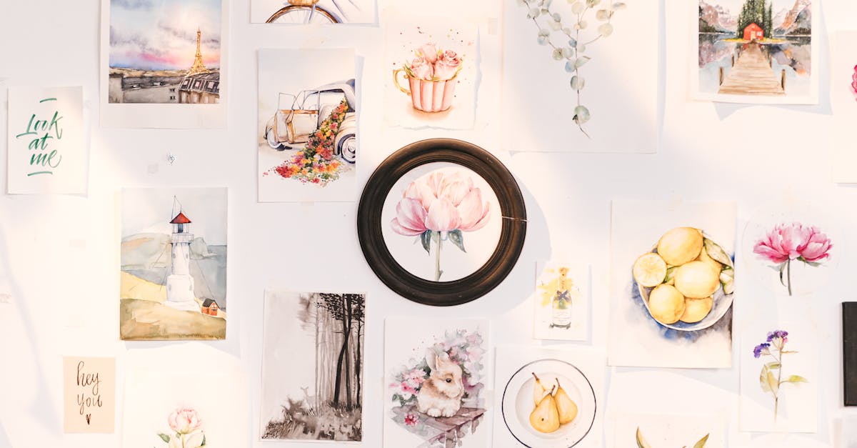 A vibrant collection of art prints showcasing flowers, landscapes, and creative designs on a wall.