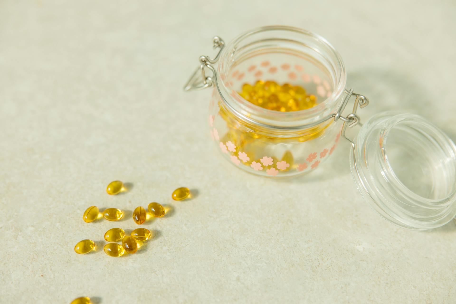 Close-Up Shot of Food Supplement on Glass Jar