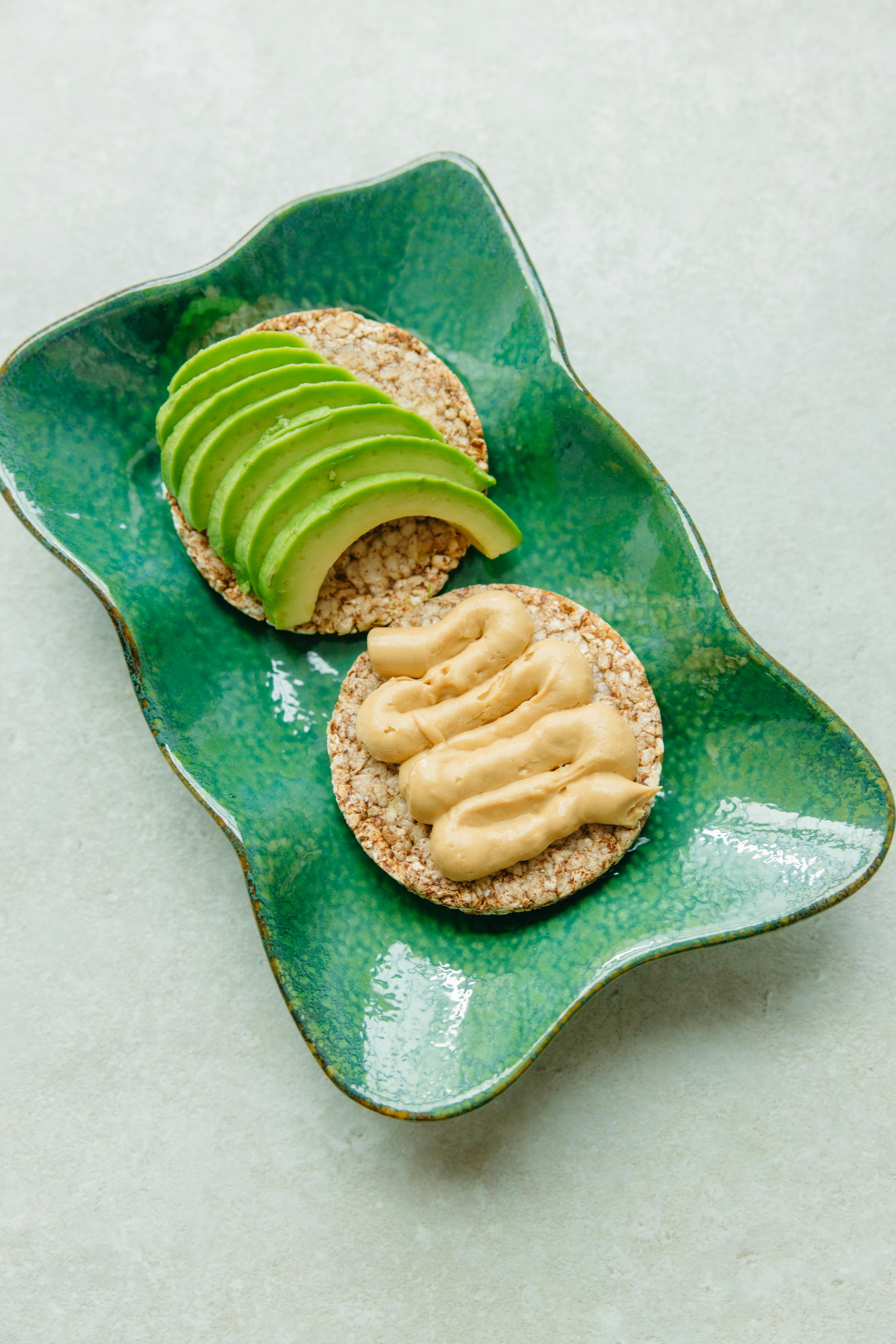 brown and green cake on green ceramic plate