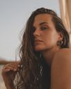 Woman With Brown Hair and Black Eyes