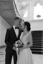 Grayscale Photo of Man and Woman Kissing