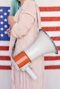 Woman Carrying Megaphone