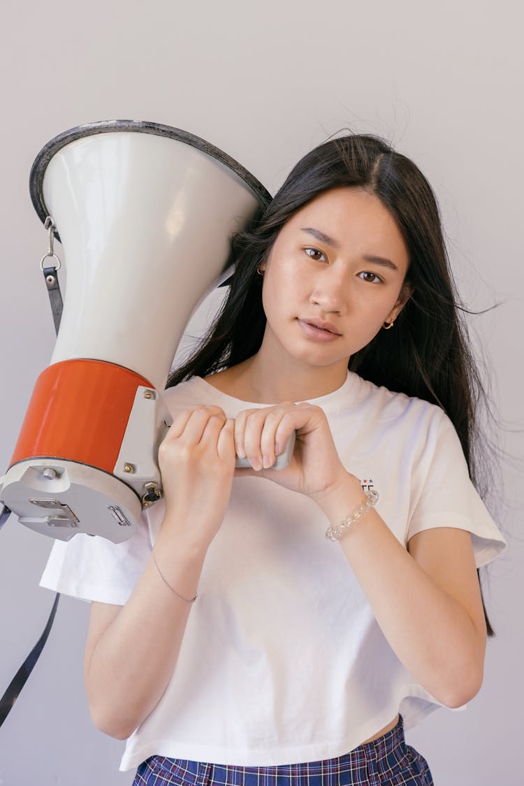 Woman Holding Loudspeaker