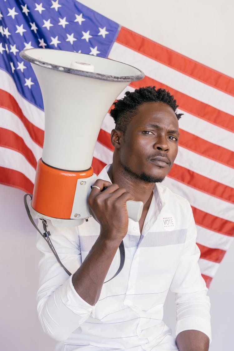 Man Holding Loudspeaker