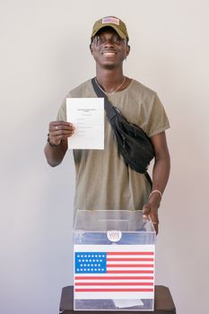 Man Holding a Voter's Paper 