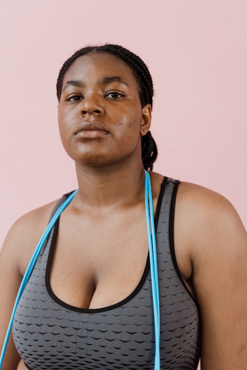 Woman in Sports Bra Looking at the Camera