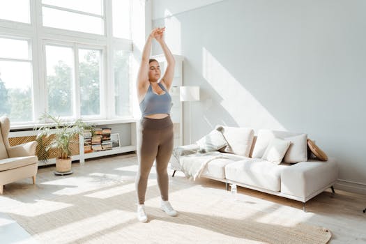 Woman in activewear stretching in a bright living room, embracing a healthy lifestyle.