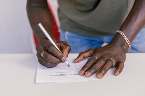 Free Close Up Photo of Person Selecting Votes Stock Photo