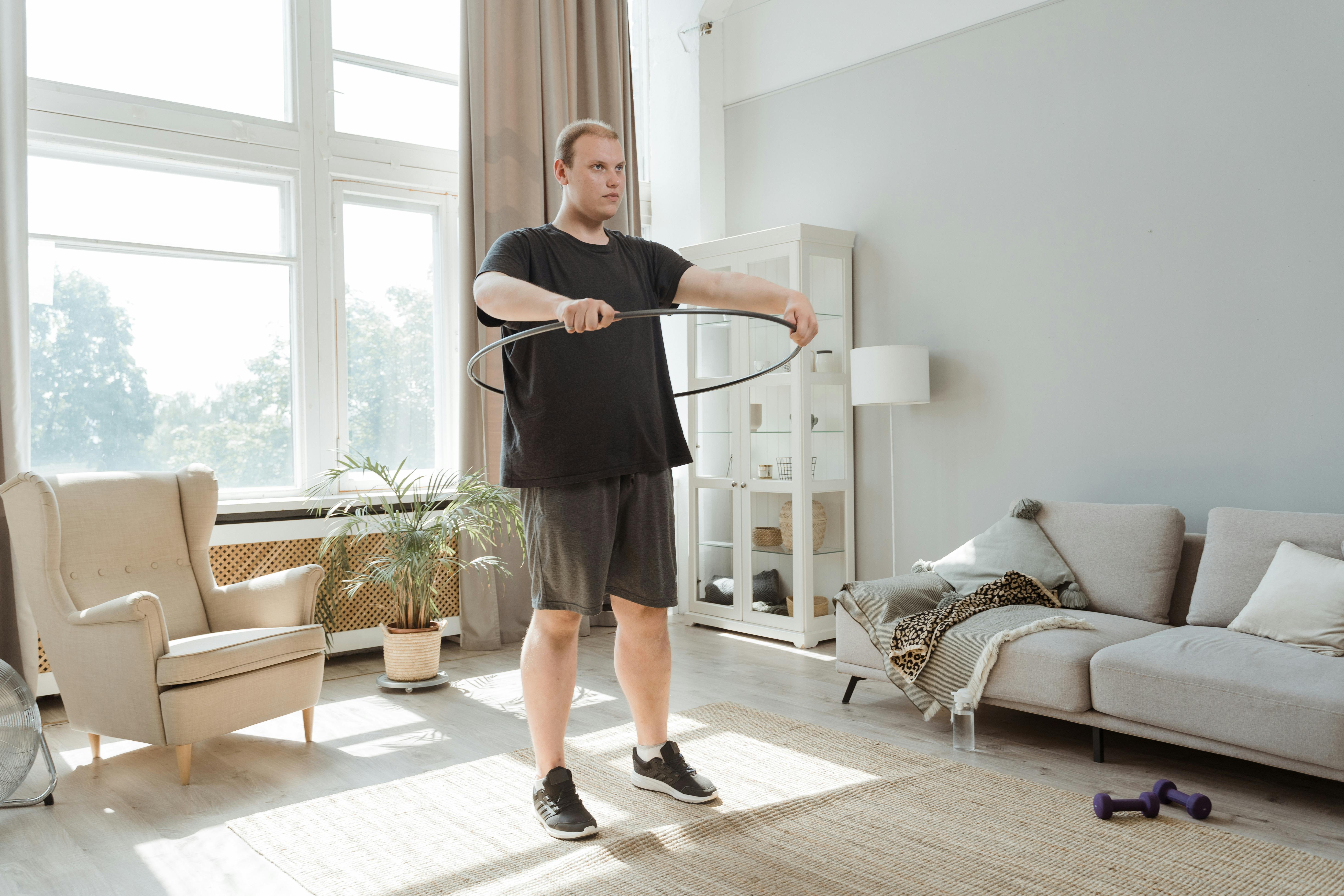 busy professional in Ho doing morning exercises in a small apartment