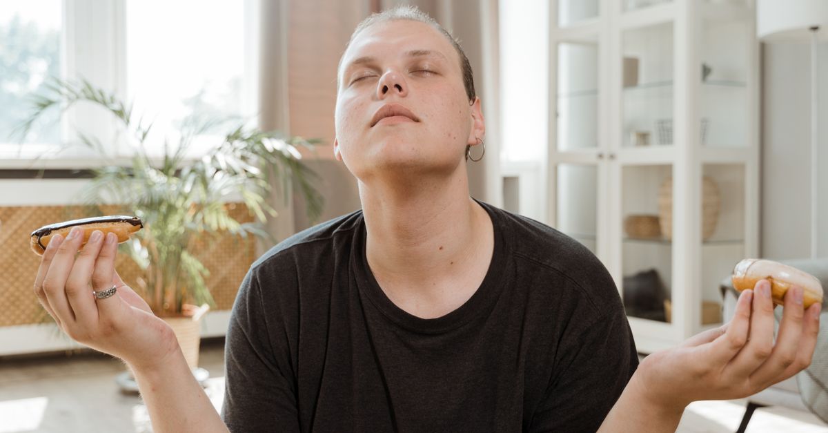 A split-screen image showing a tired person reaching for a donut on one side, and a well-rested person choosing a smoothie on the other