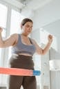 Woman in Black Tank Top and Blue Denim Bottoms