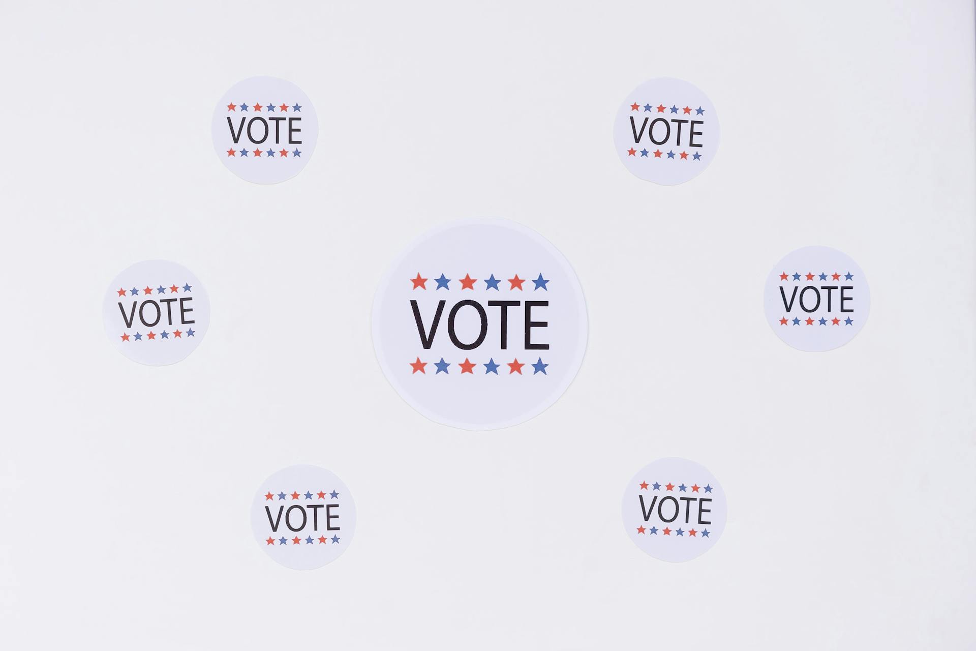 Vote Stickers on White Surface