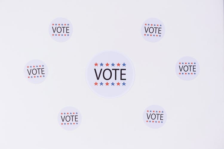 Vote Stickers On White Surface