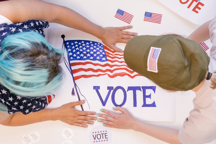 High Angle Shot Of People Holding Election Banner