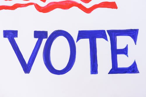 Free Close Up Photo of Word "Vote" Stock Photo
