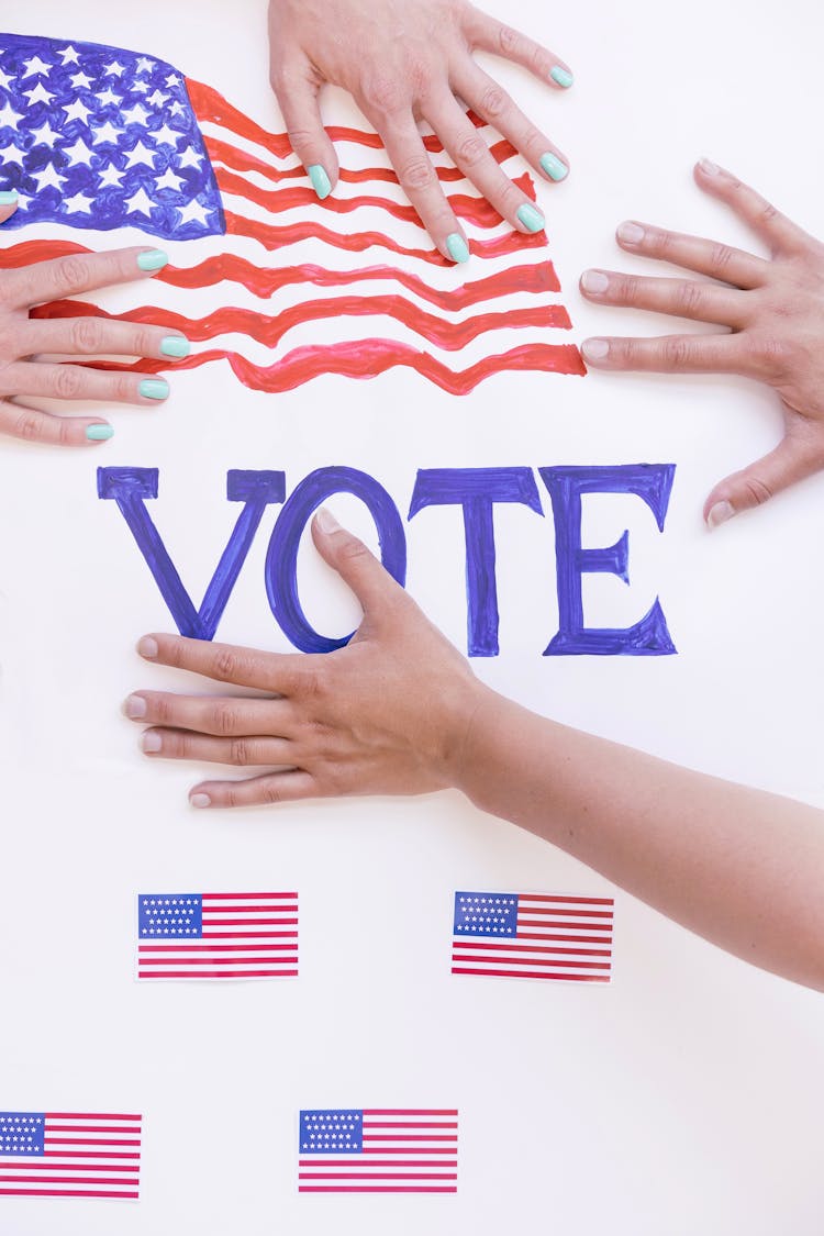 People Holding Vote Banner