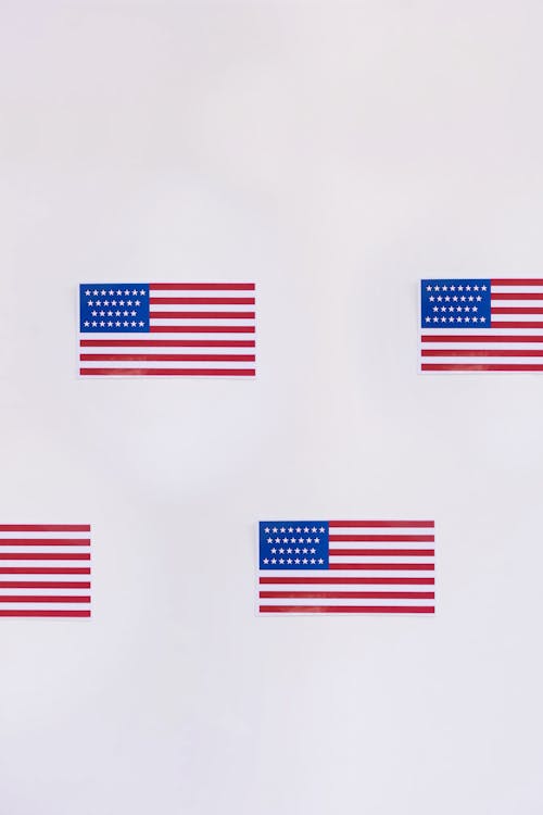 American Flags on White Surface
