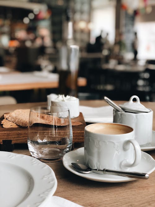 White Ceramic Cup on White Ceramic Saucer