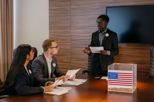 Multiracial group of professionals engaged in a political meeting with a ballot box.
