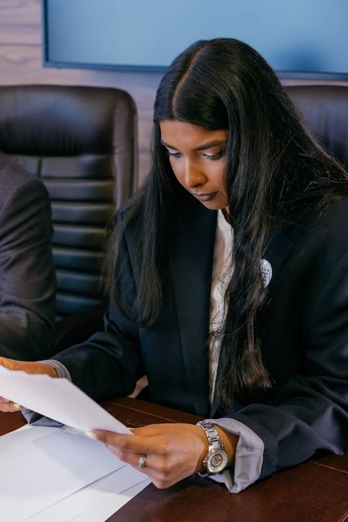 Professional Woman Looking at Documents