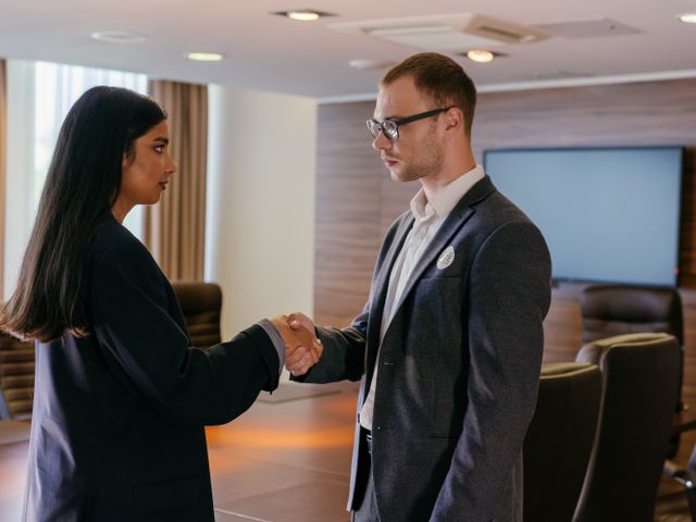 Two professionals shaking hands after agreeing a business-to-business supply arrangement