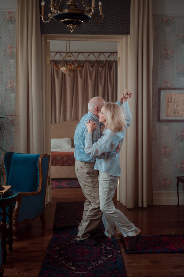 An Elderly Couple Dancing Together