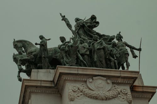 Statues under Gray Sky