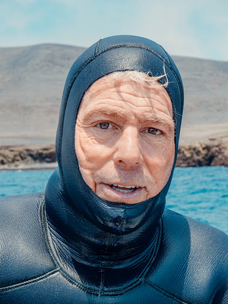 A Mam Wearing A Scuba Diving Suit