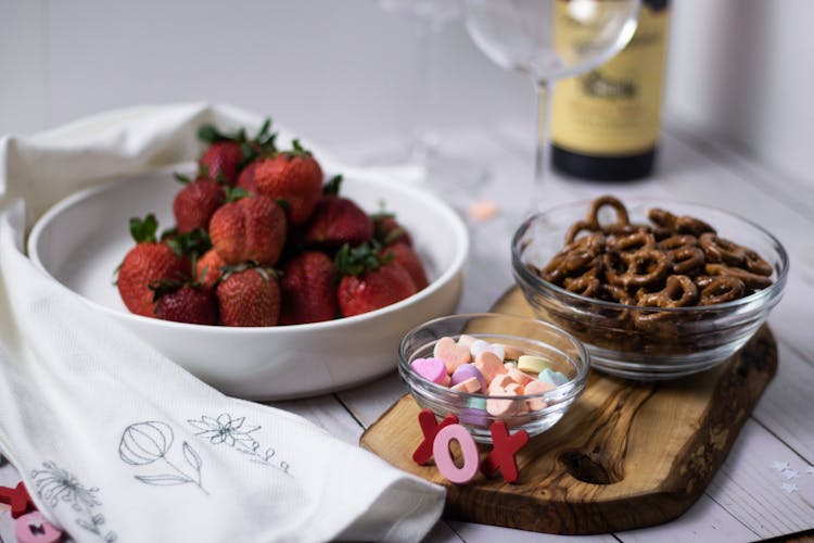 Close-Up Shot Of Snacks And Fruits On A Bowl