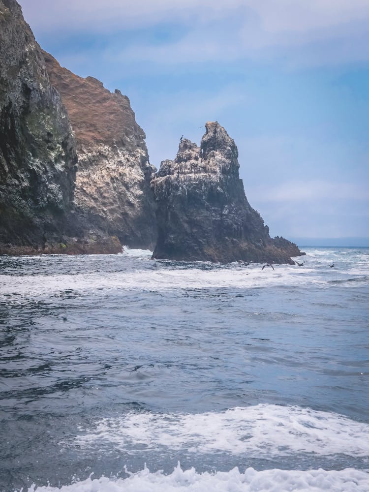 A Large Stack Of Rock In The Sea