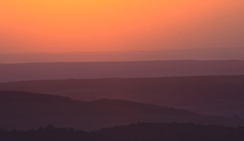 Free Silhouette of Mountain Ranges at Sunset Stock Photo