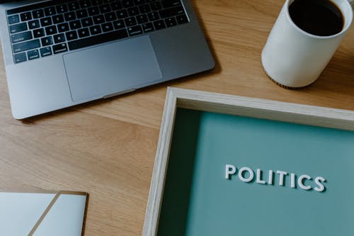 Free The Word Politics Spelled in White Letters Stock Photo
