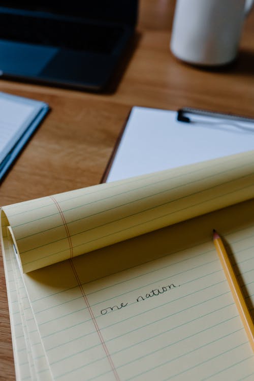 Political Phrase Written on Paper on Desk