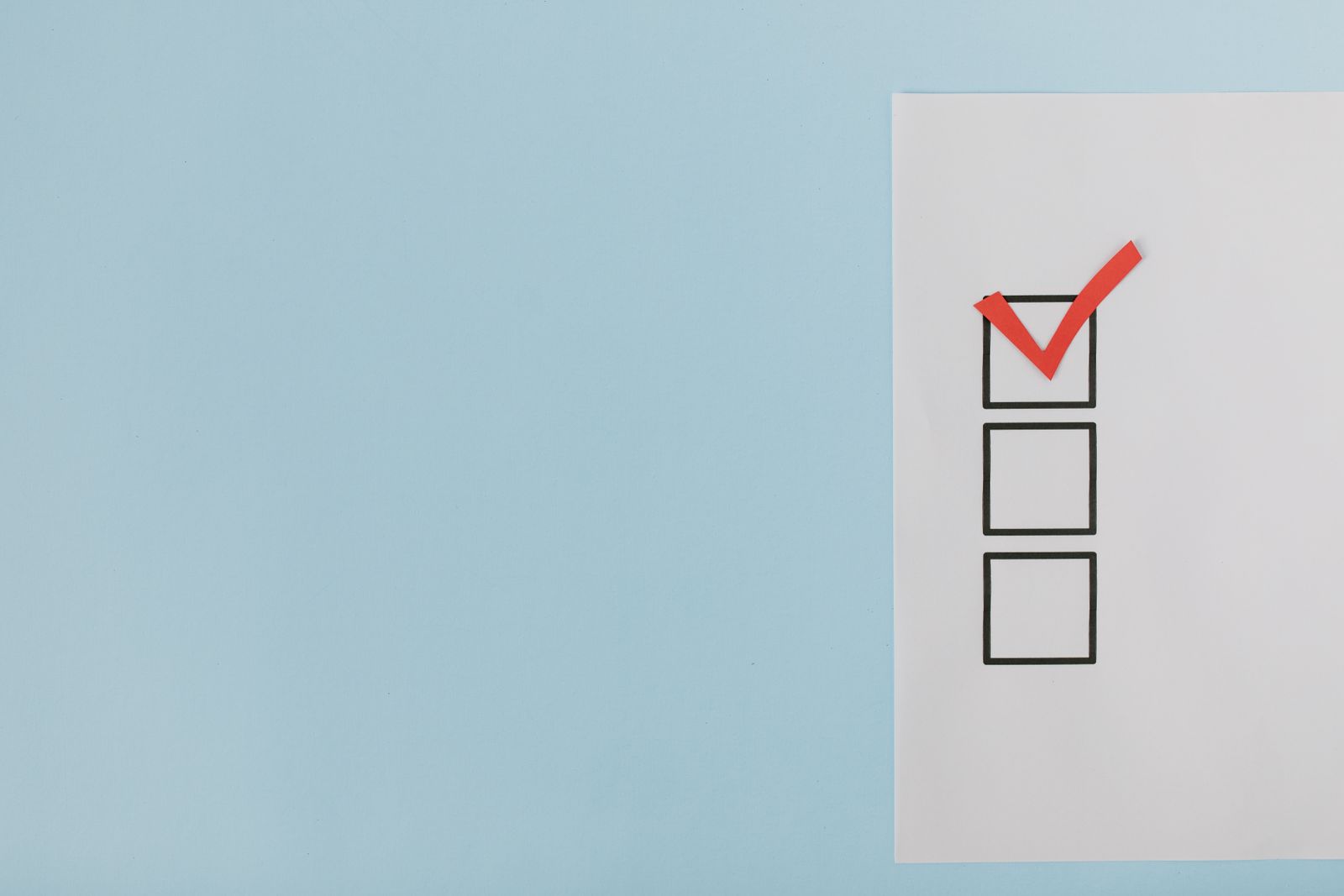Checkbox list with the top box ticked off in red