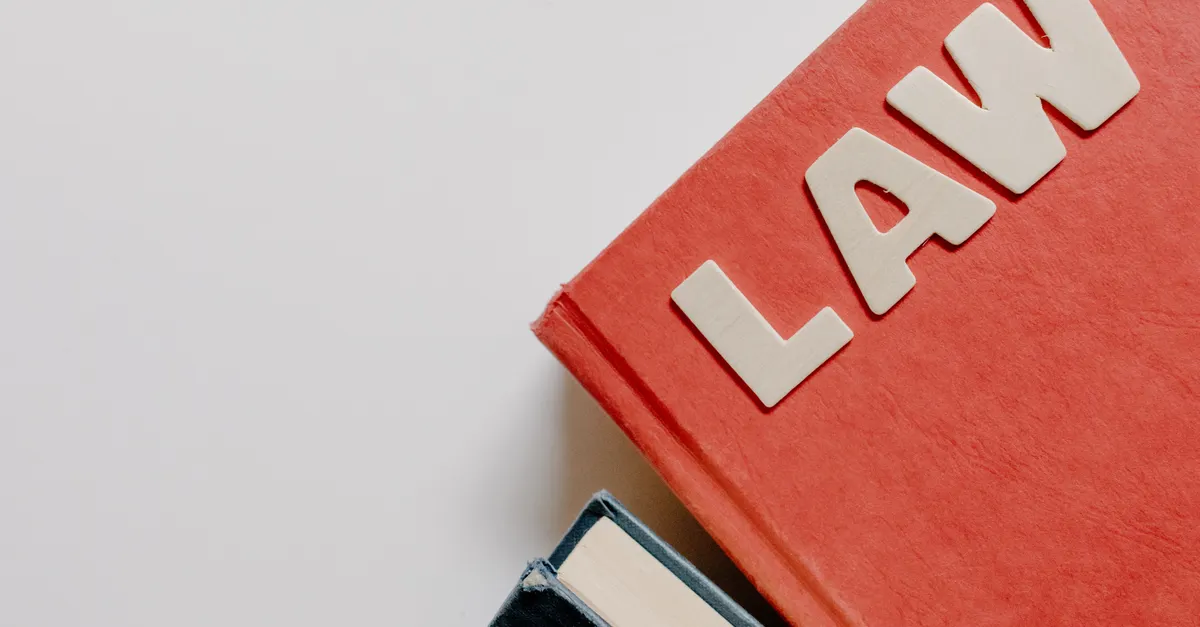 Rows of bound law reports on library shelves