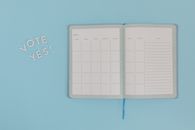 White Graphing Paper on Blue Surface