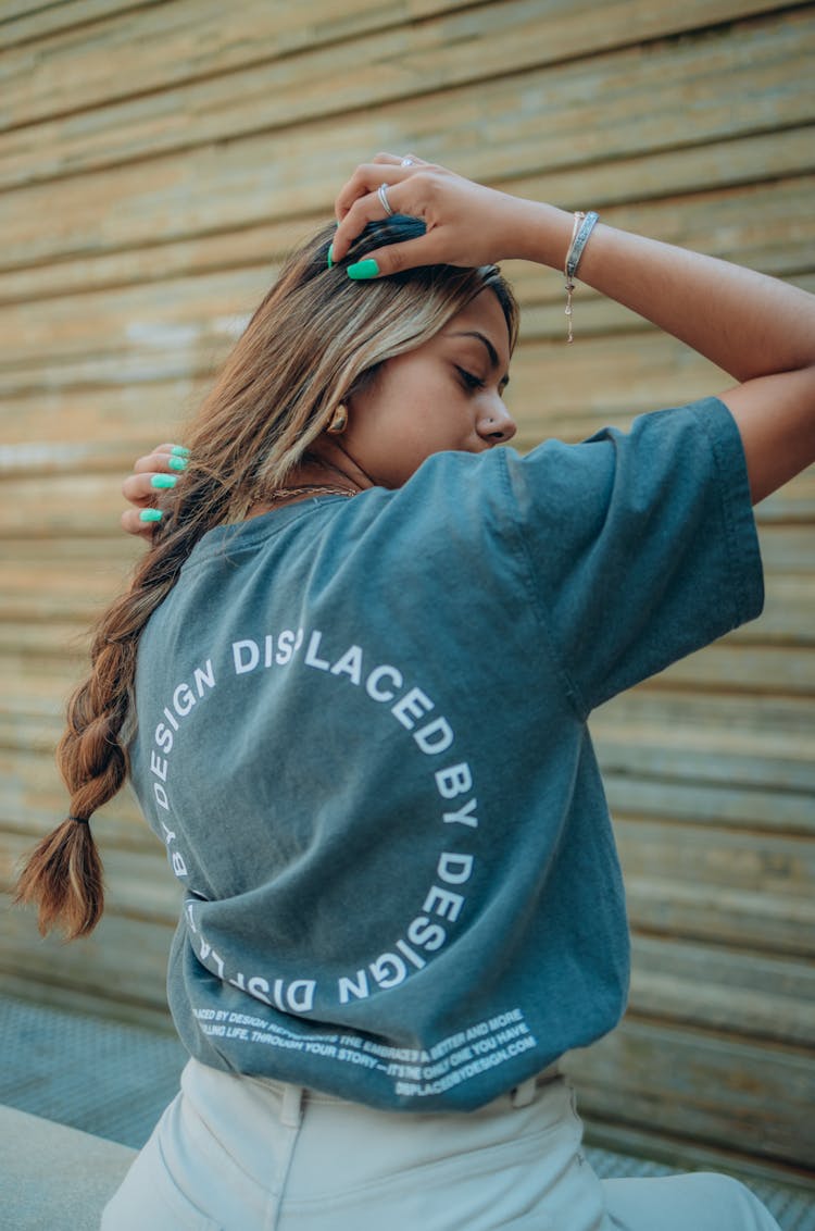 Back View Of A Woman Modeling In An Oversized T Shirt