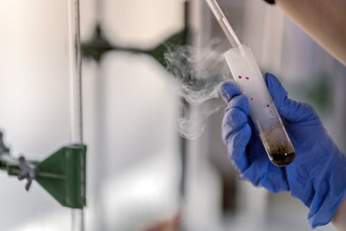 Close up of Chemist Holding Test Tube