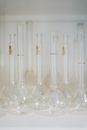 Clear Glass Bottles on White Table