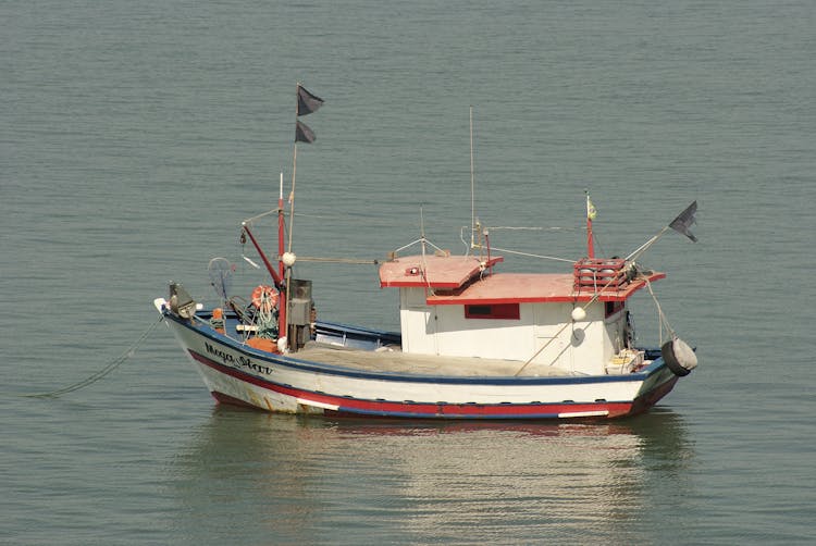 Small Fishing Boat On Water