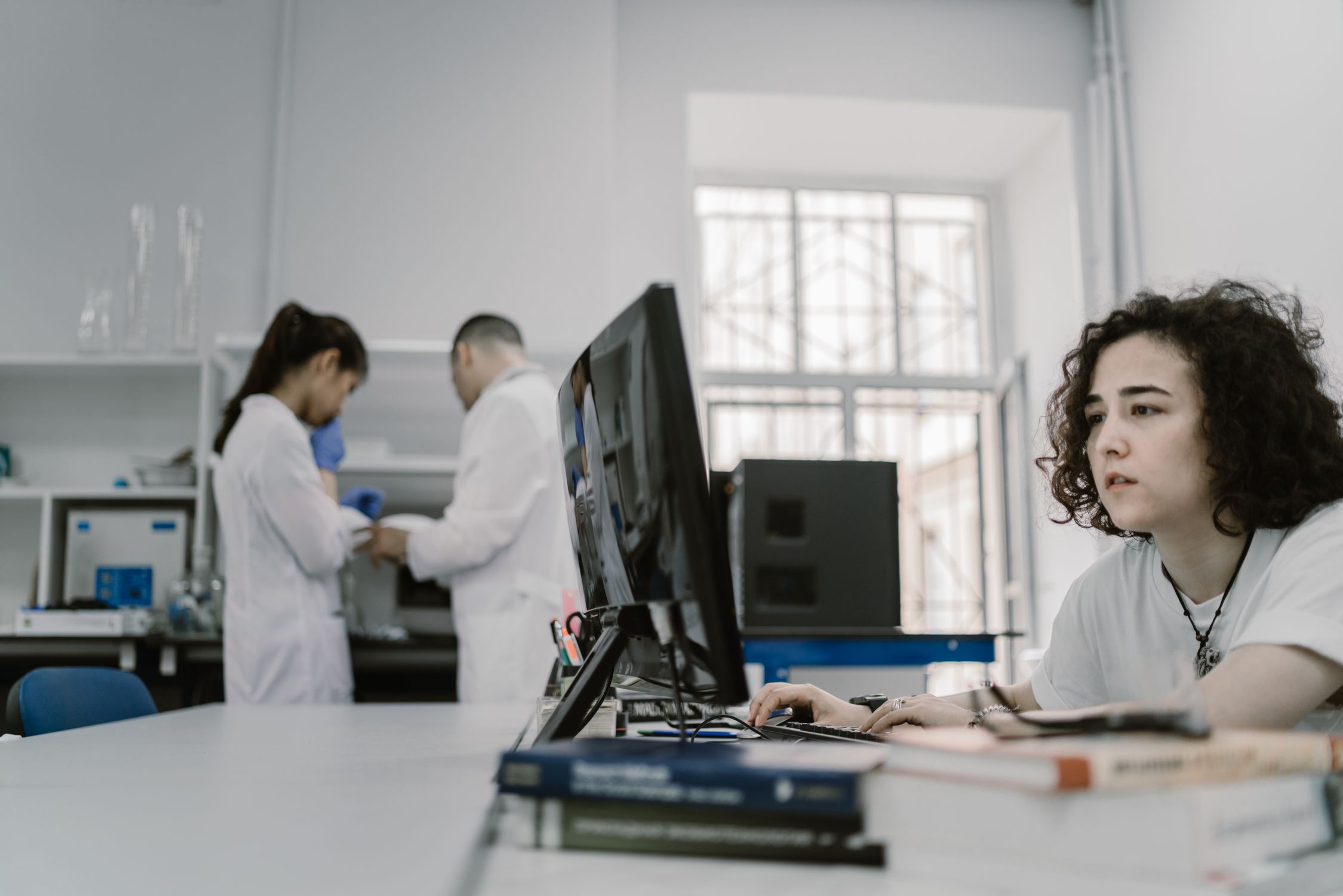 Woman Working on Computer at Laboratory · Free Stock Photo