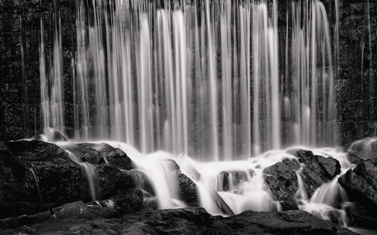 Water Falling On The Rocks