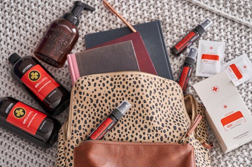 Notebooks, Hand Wipes and Cosmetics in Bag