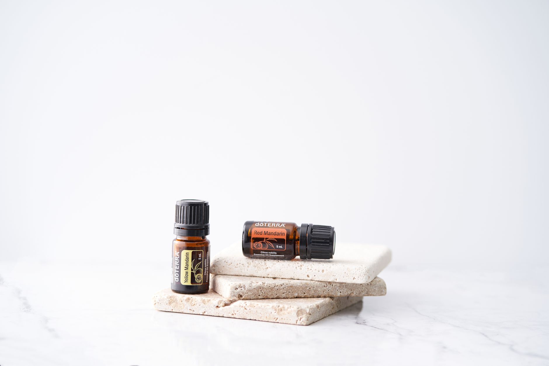 Stone Ritual Oil Trio — essential oil bottles on stone